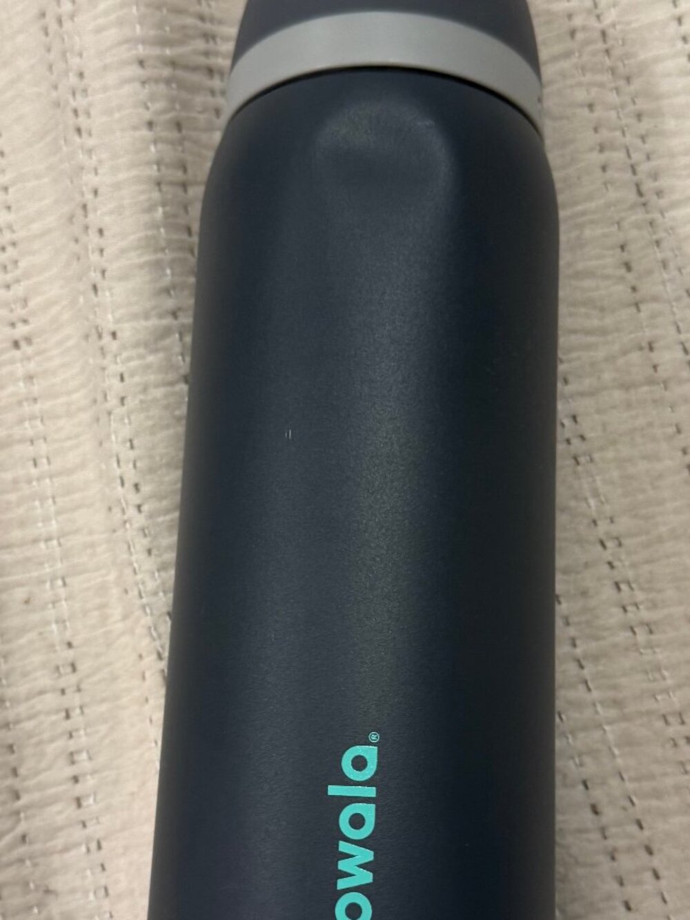 Owala FreeSip stainless steel water bottle Teal Logo Dark Gray Finish 32 oz